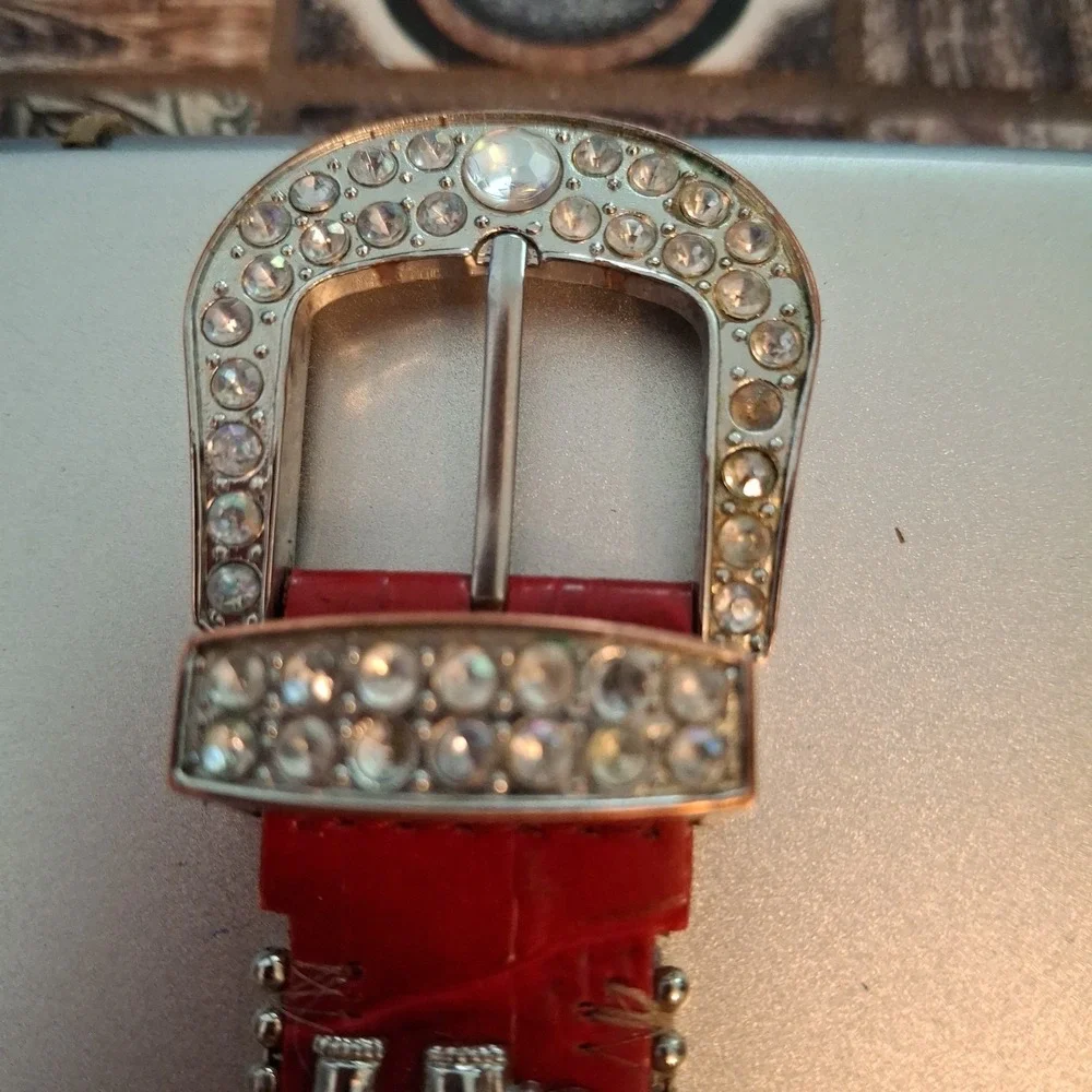 Geneva 92643 Womens Buckle Watch. Red Band, Silvertone,Elephant & Gem Accents.